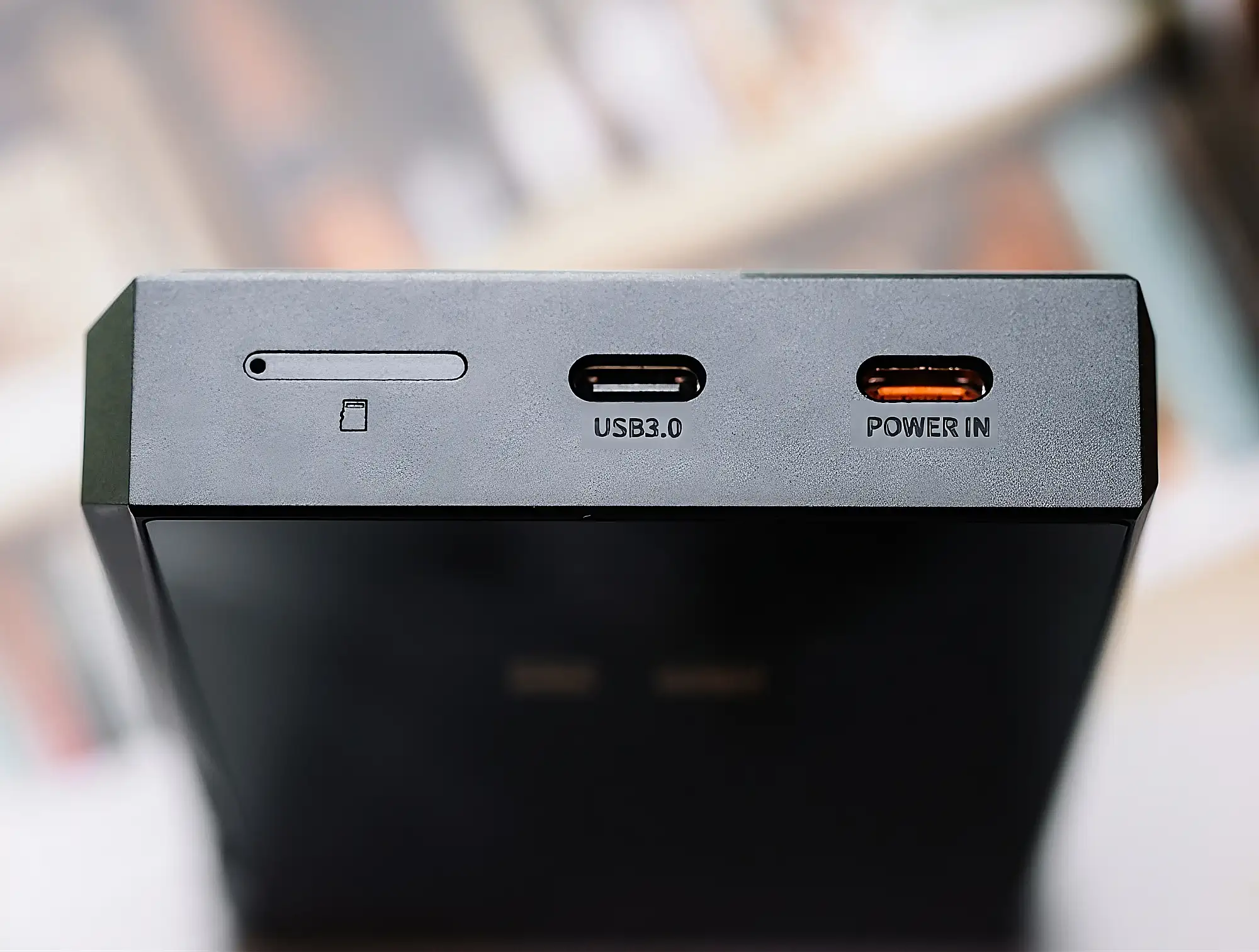 Нижняя панель FiiO M23: слот microSD, порт USB 3.0 и разъем POWER IN.